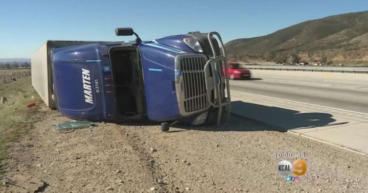 Strong winds topple big rigs in Inland Empire